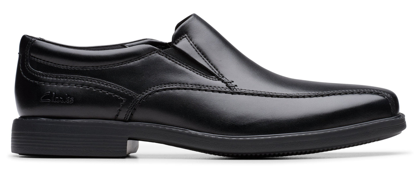 Black leather slip-on dress shoe.