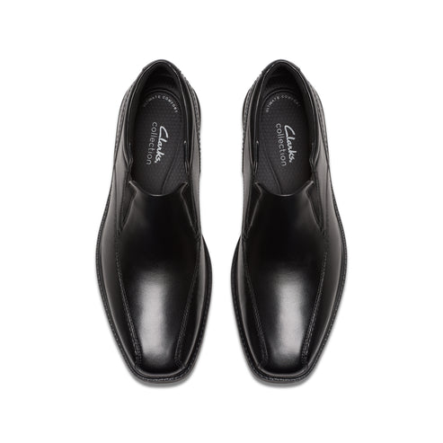 Pair of black leather square-toe dress shoes.
