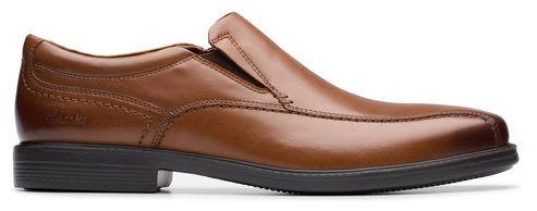 Brown leather slip-on dress shoe with a dark sole and a low heel.