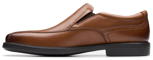 A brown leather slip-on dress shoe with a black sole and heel.