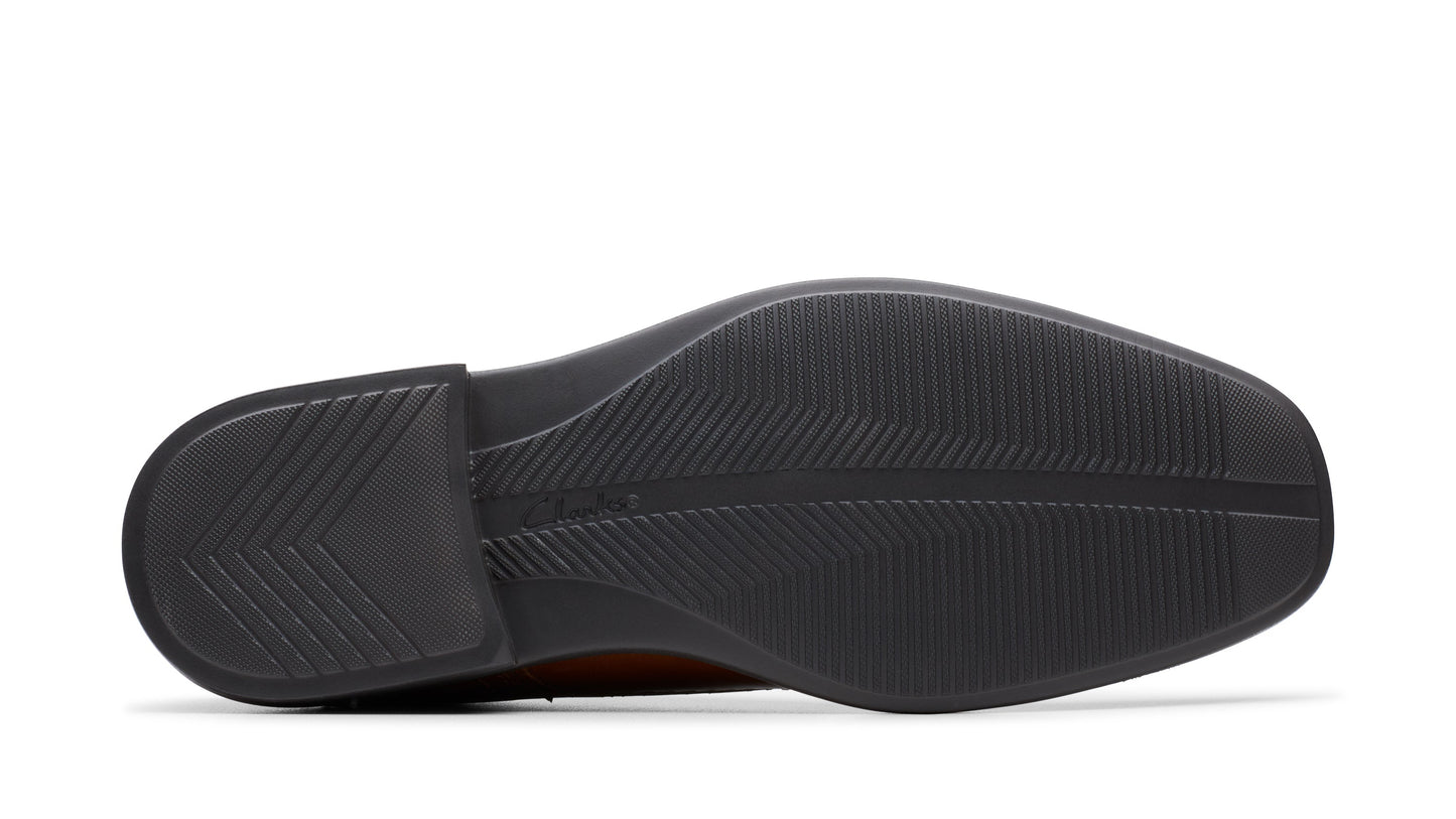 Sole of a shoe with geometric tread.