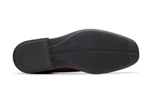 Sole of a shoe with geometric tread.