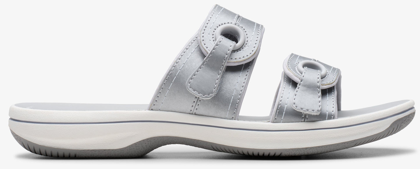 Silver sandal with two adjustable straps.