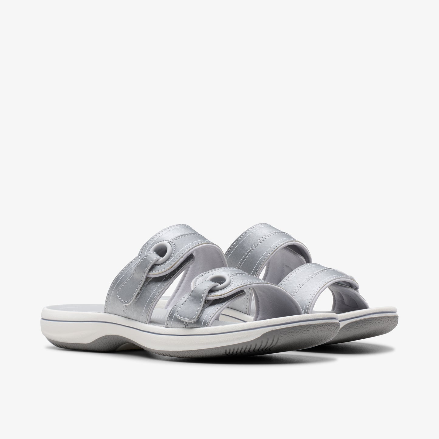 Pair of silver-colored, two-strap adjustable sandals.