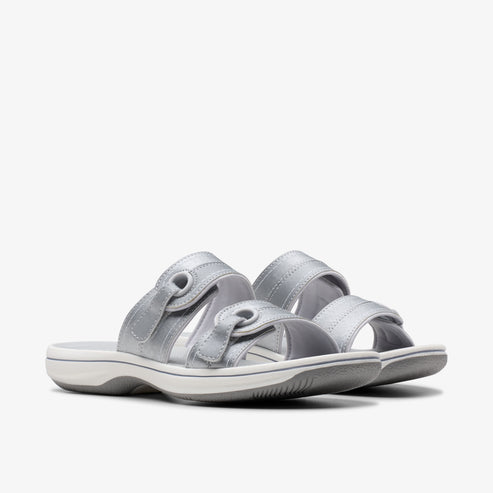 Pair of silver-colored, two-strap adjustable sandals.