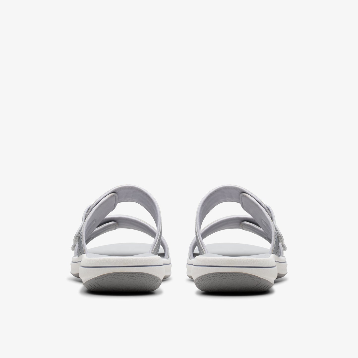 Pair of gray two-strap sandals, seen from the back.