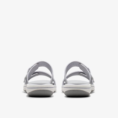 Pair of gray two-strap sandals, seen from the back.