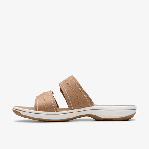 Side view of a tan sandal with two straps.