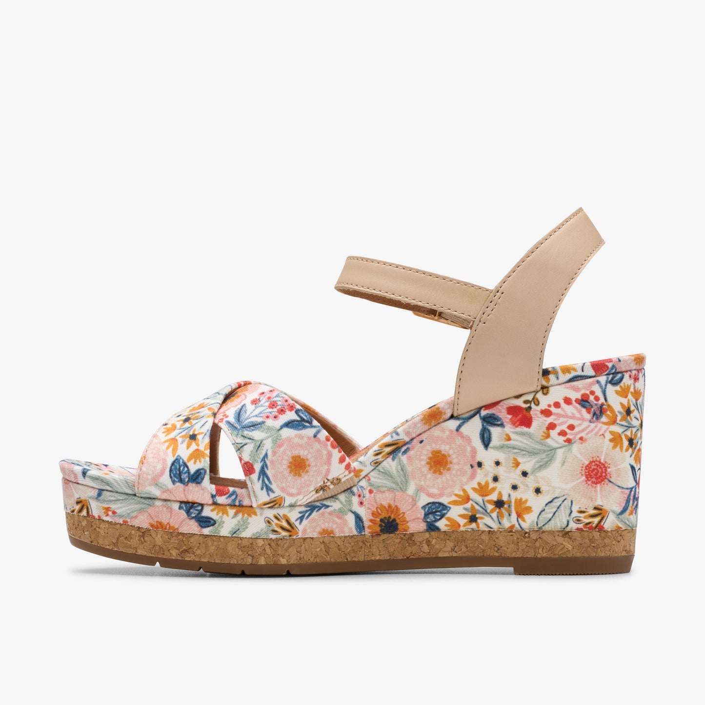 Floral wedge sandal with ankle strap.