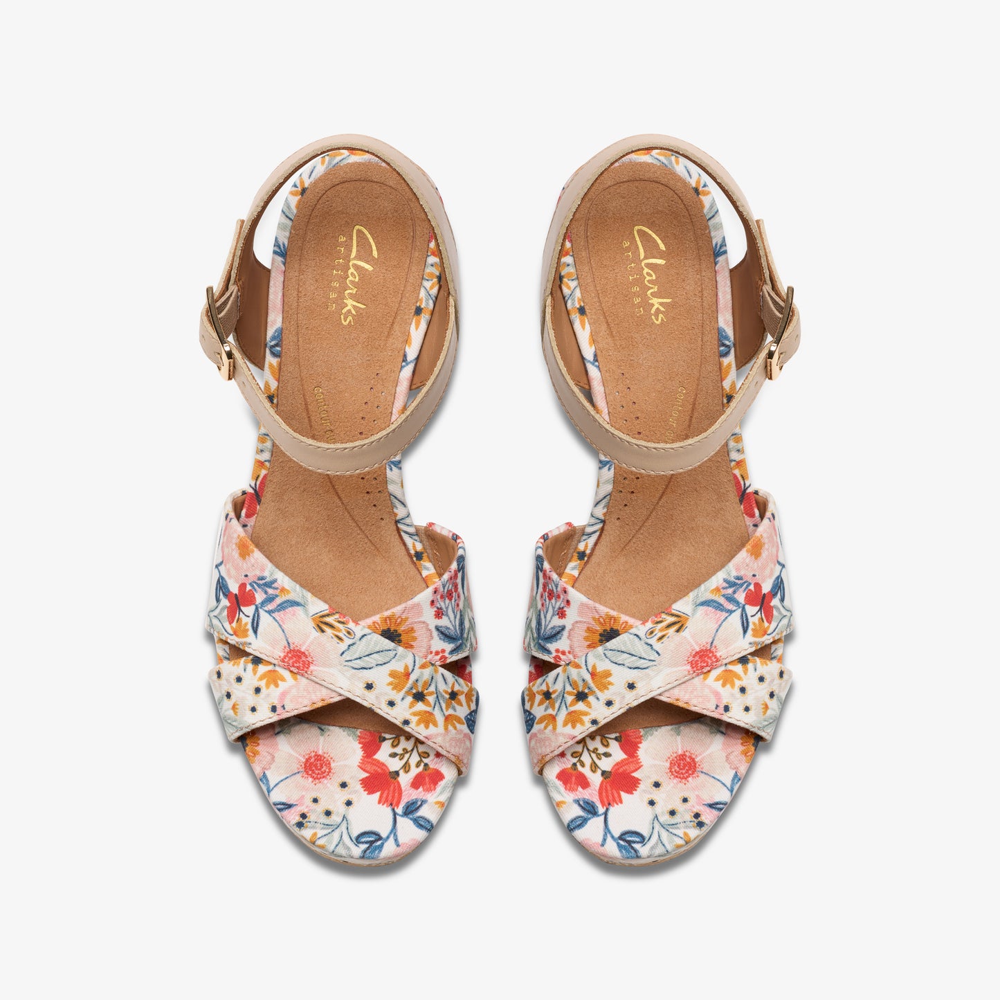 Floral print sandals with an ankle strap and cross-over straps.