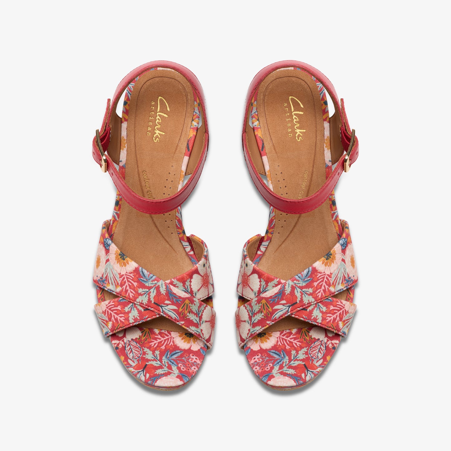 Overhead view of floral print open-toe sandals with red ankle straps.