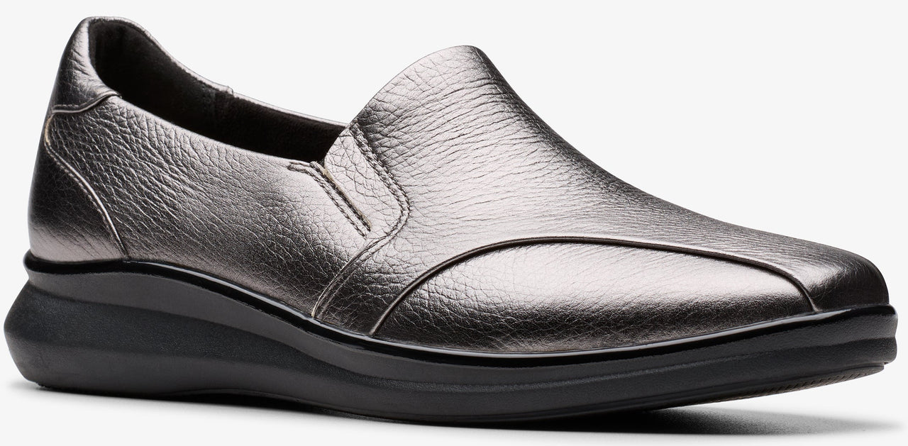 Silver slip-on shoe with a black sole.