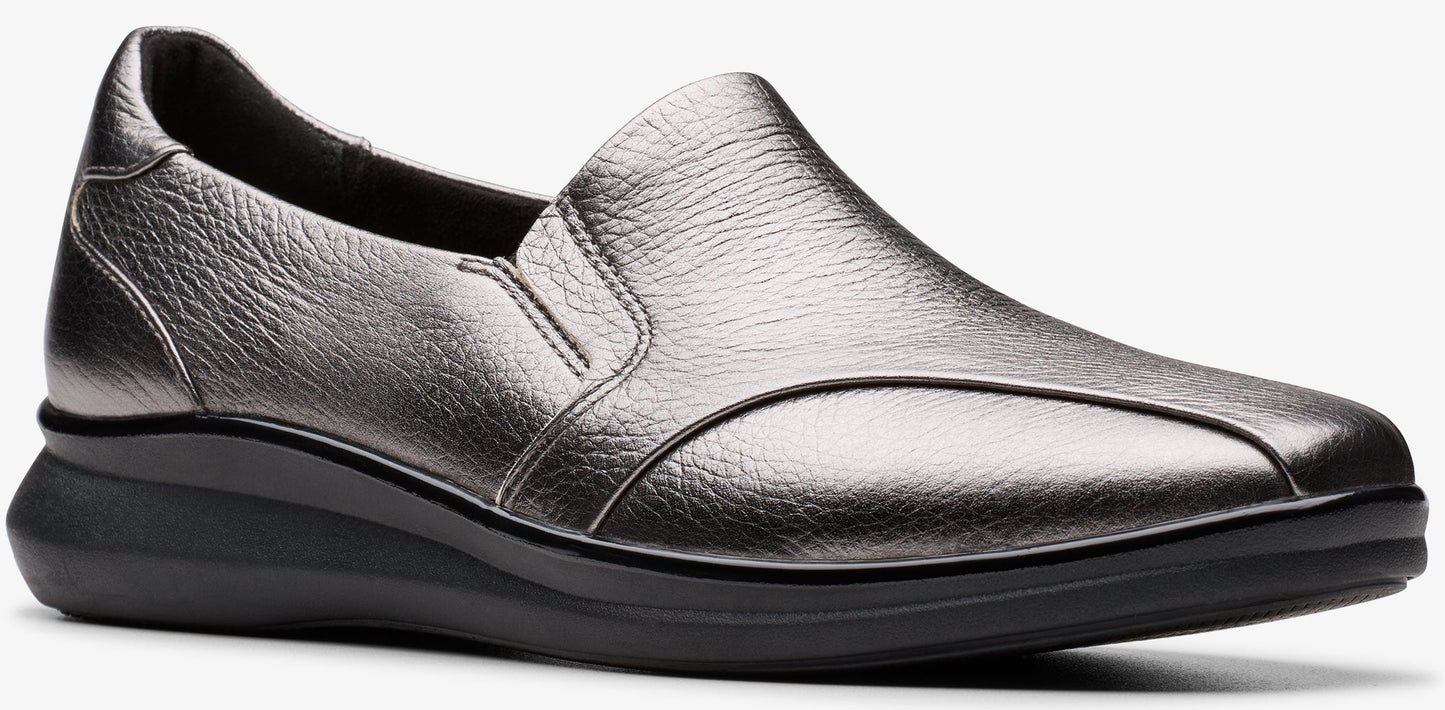 Silver slip-on shoe with a black sole.