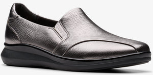 Silver slip-on shoe with a black sole.