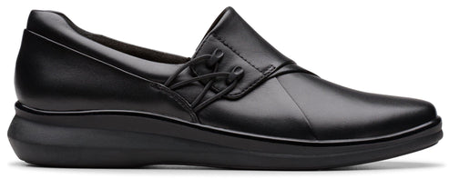 Black slip-on dress shoe with decorative ties.