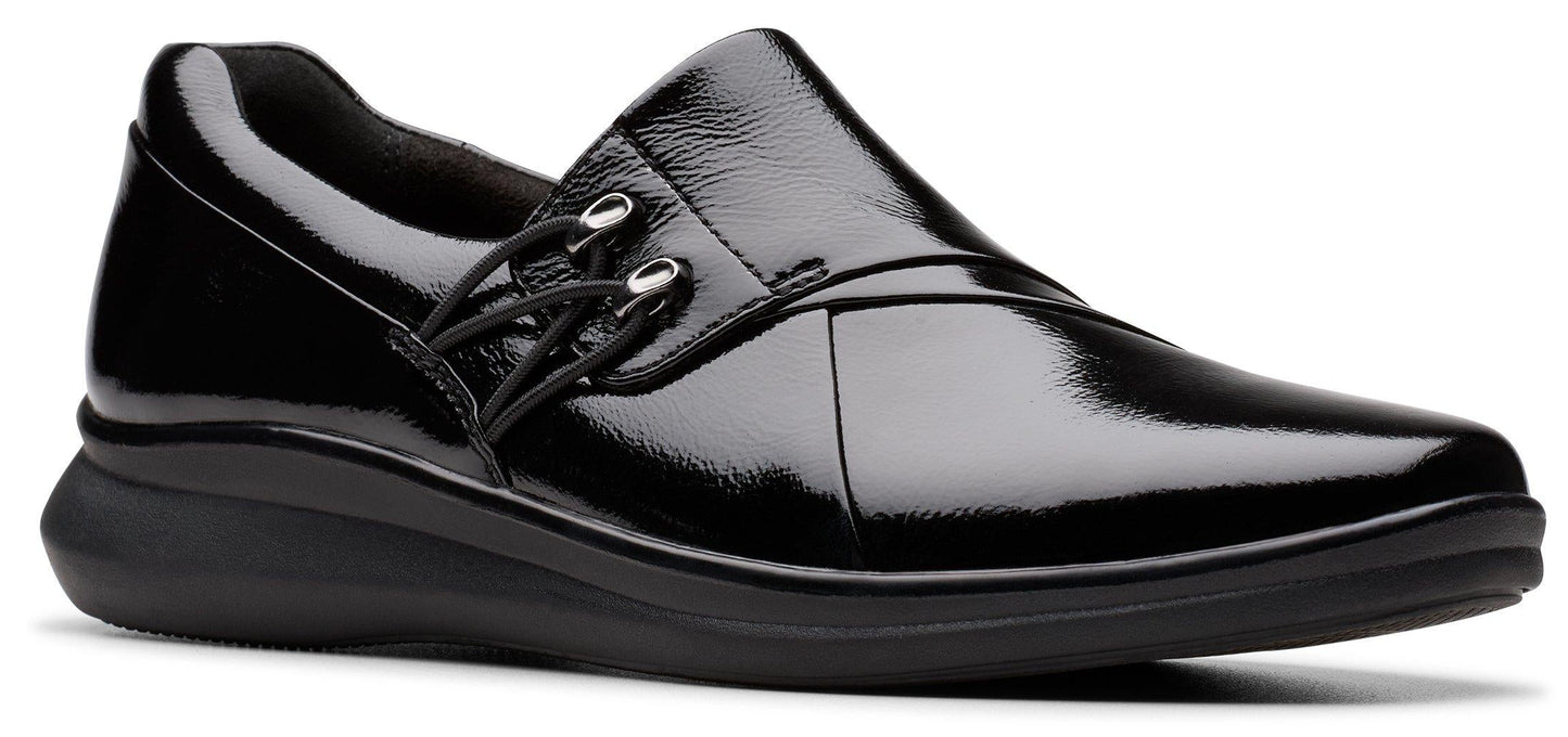 Black patent leather shoe with elasticized laces.