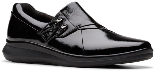 Black patent leather slip-on shoe with crossover elastic detail.