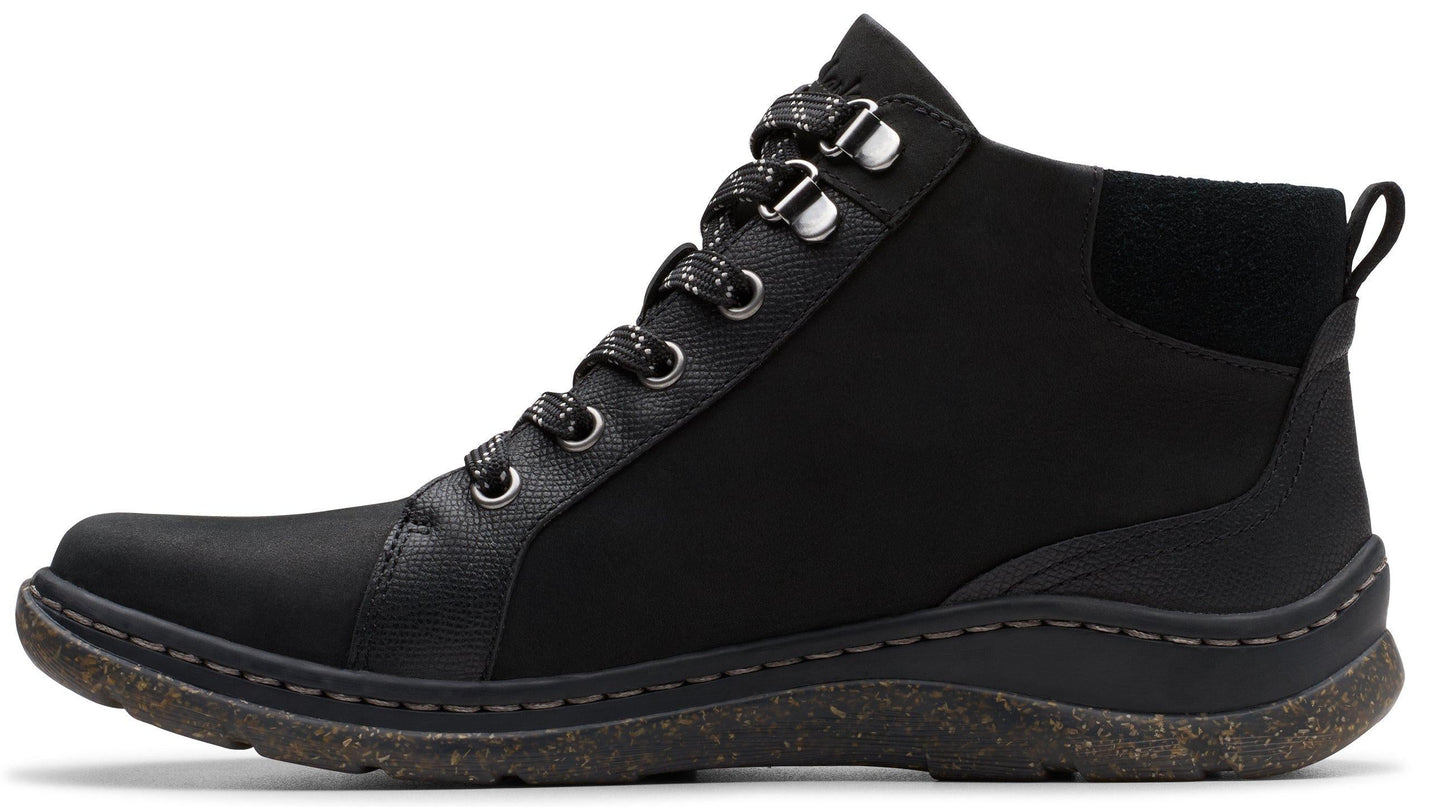 Black ankle boot with lace-up closure and contrasting sole.