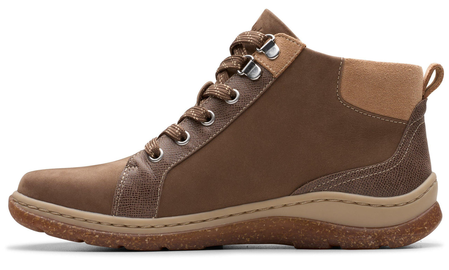Side view of a brown boot with laces and a light brown sole.