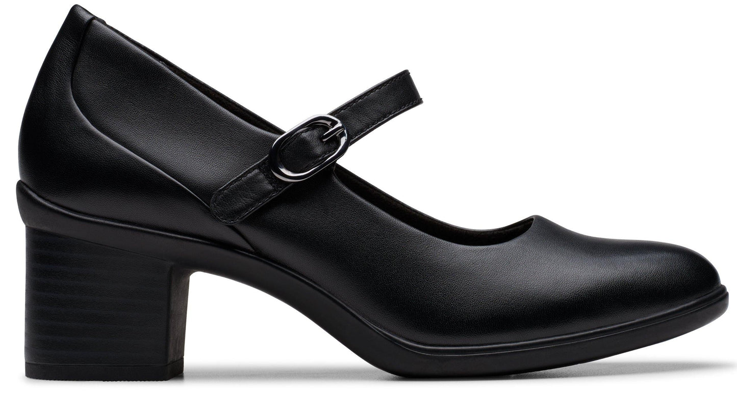Black Mary Jane style shoe with block heel and adjustable strap.