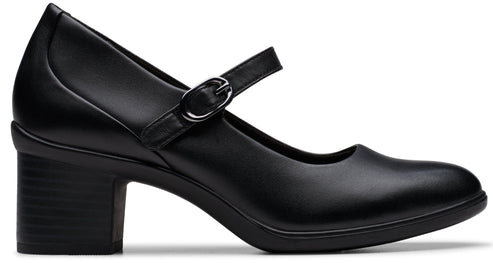 Black Mary Jane style shoe with block heel and adjustable strap.