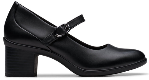 Black Mary Jane style shoe with a block heel and buckle strap.