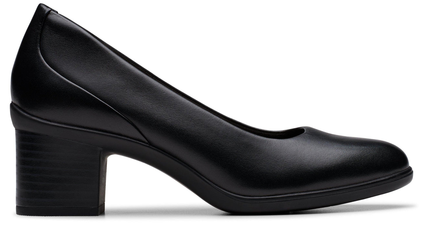 Black block heel dress shoe with rounded toe and leather upper.