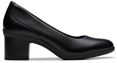 Black block heel dress shoe with rounded toe and leather upper.