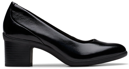 Black patent leather block heel pump.