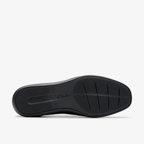 Black shoe sole with grid pattern and 'Clarks' text.
