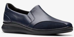 Navy leather slip-on shoe with a low black heel.