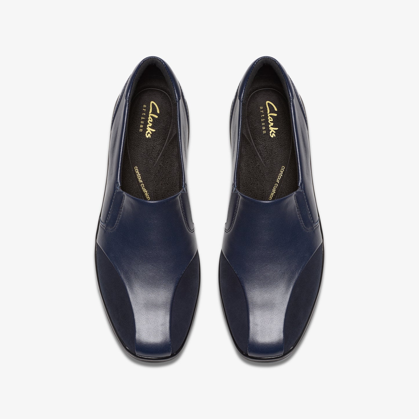 Top-down view of navy blue slip-on leather shoes with square toes and cushioned insoles.