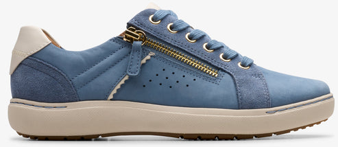 A light blue sneaker with a gold zipper.