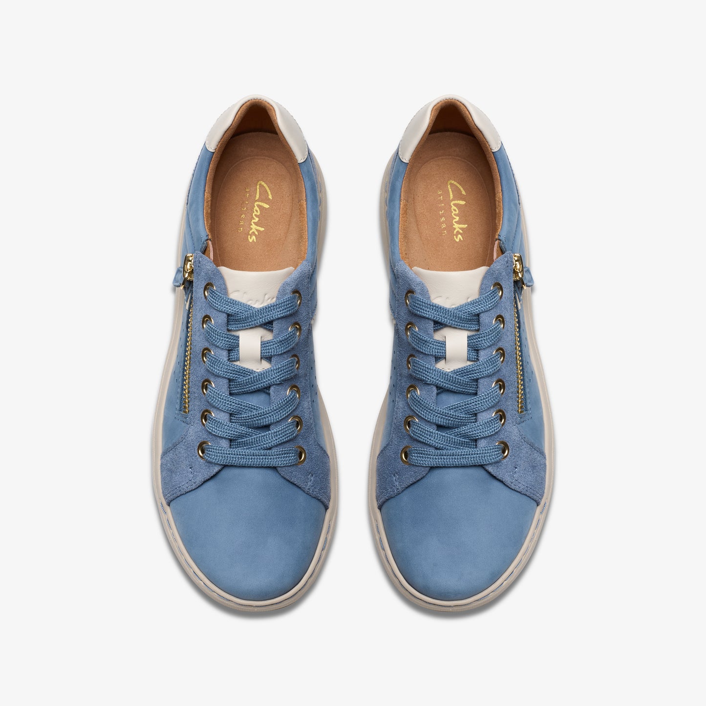 Pair of blue laced sneakers with side zippers.