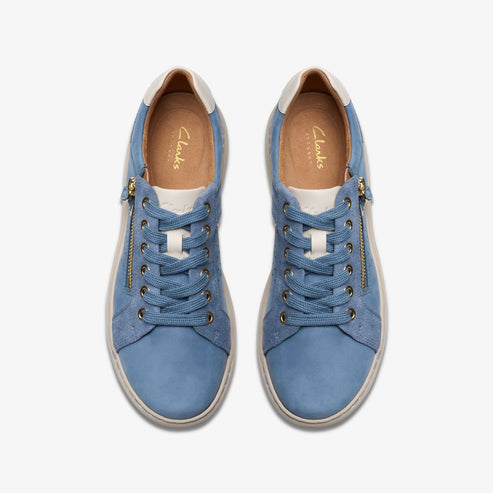 Pair of blue laced sneakers with side zippers.