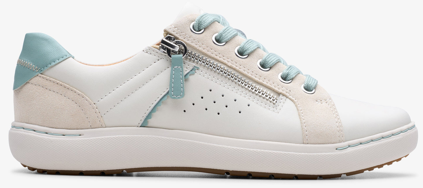 A white sneaker with a side zipper and mint green accents.