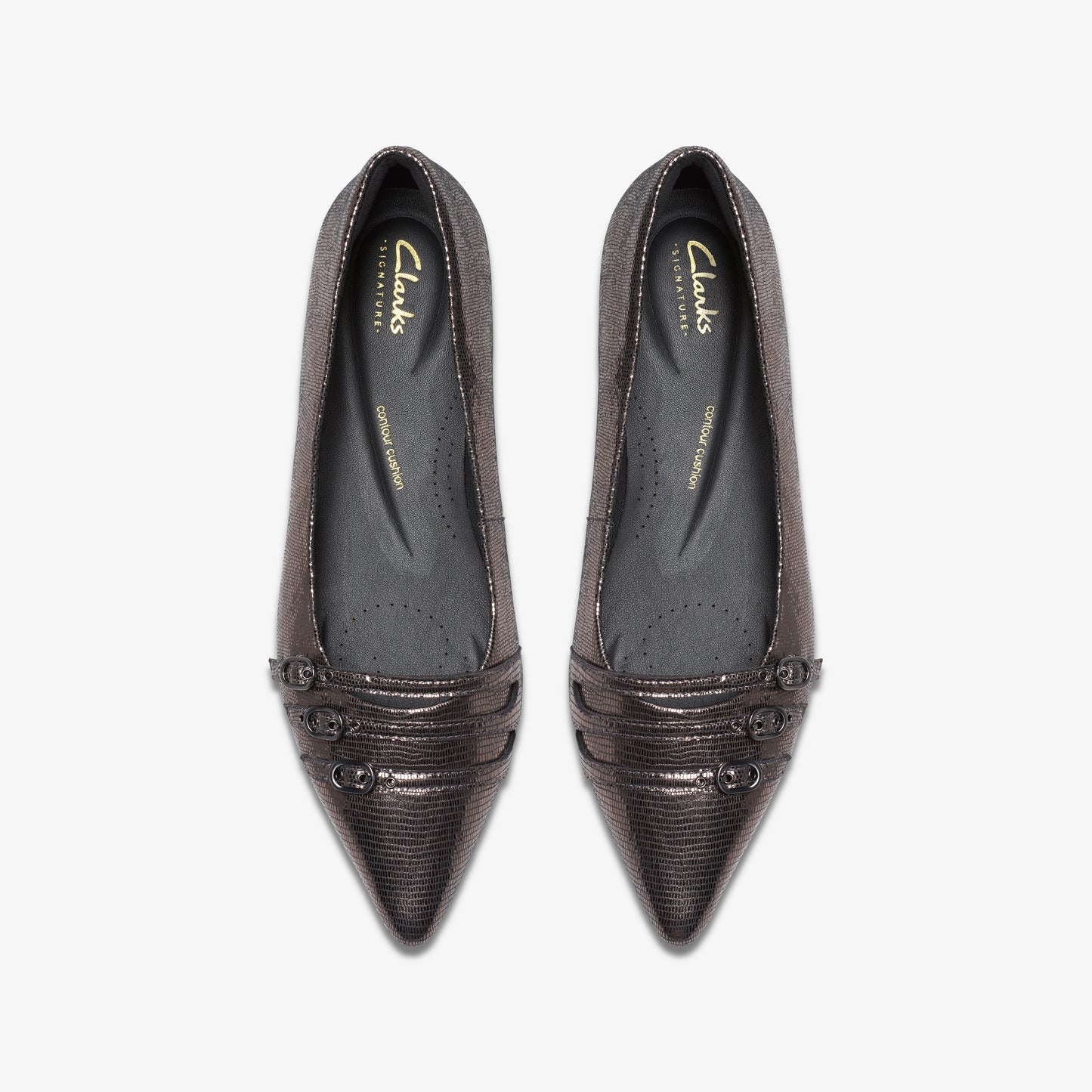 Pair of shiny, metallic pointed-toe flats with decorative strap and visible insole labeled "Clarks Signature".