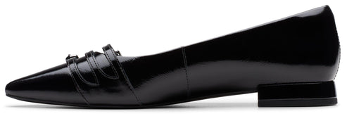 A black patent leather loafer with a pointed toe and triple monk strap detail.