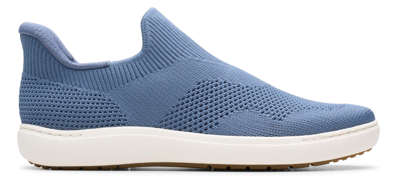 A blue, knit slip-on sneaker with a white sole.