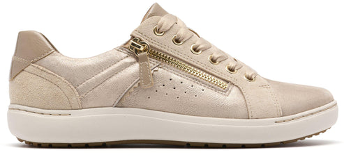 A beige sneaker with a gold zipper.