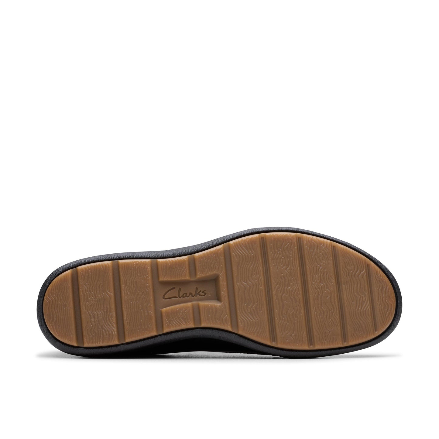 shoe sole with the word "Clarks" across the middle
