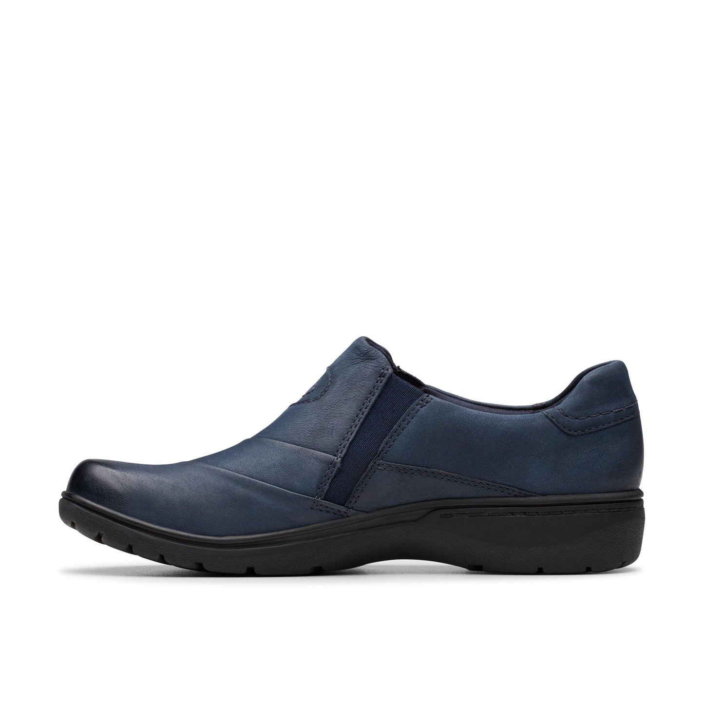 Navy slip-on shoe with a rounded toe and a low, black sole.