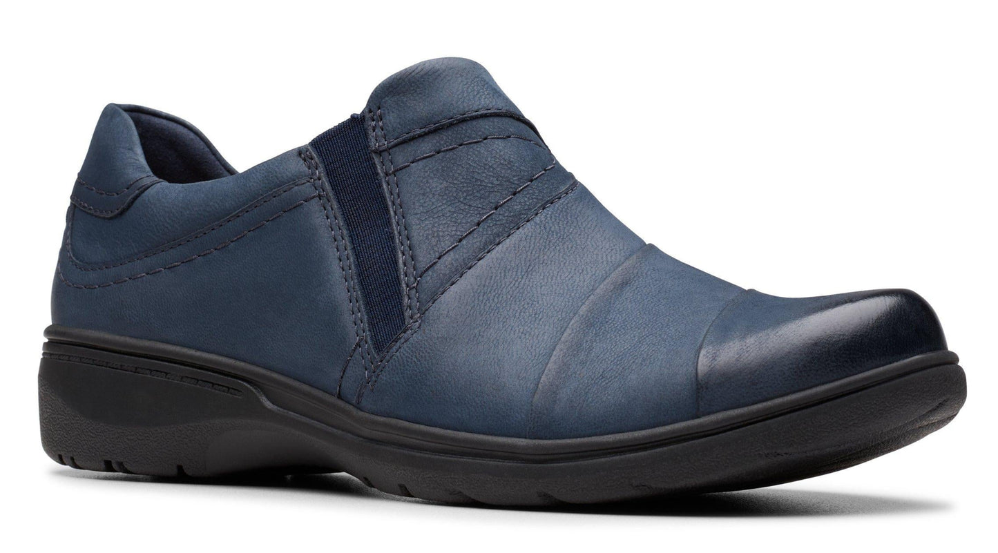 Slip-on style shoe with navy leather upper and black sole.