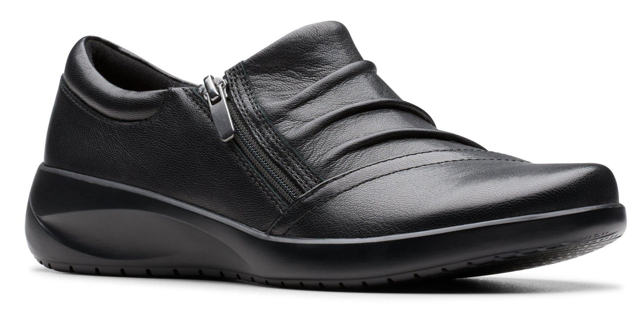 A black leather women's dress shoe with a side zipper and layered upper.