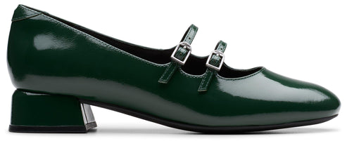 Green patent leather Mary Jane shoe with block heel and double straps with buckles.
