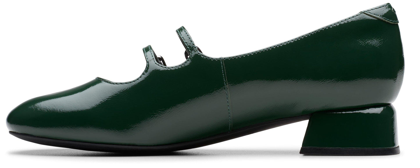 Dark green Mary Jane shoe with two straps and a block heel.