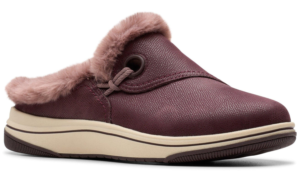 Maroon slip-on shoe with faux fur trim and a tan sole.
