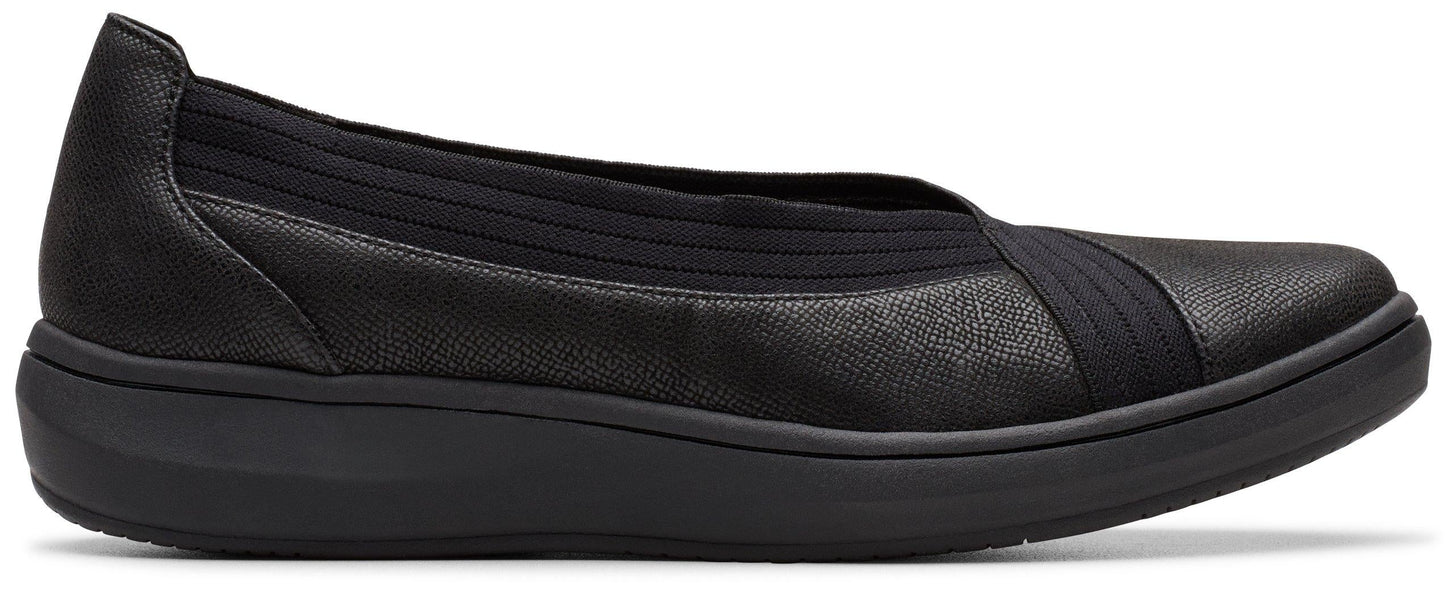 Black slip-on shoe with an elastic band.