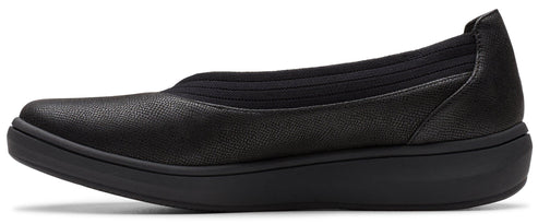 A women's black slip-on shoe with a flat heel.