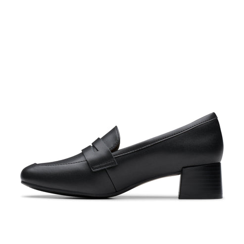 Black heeled loafer.